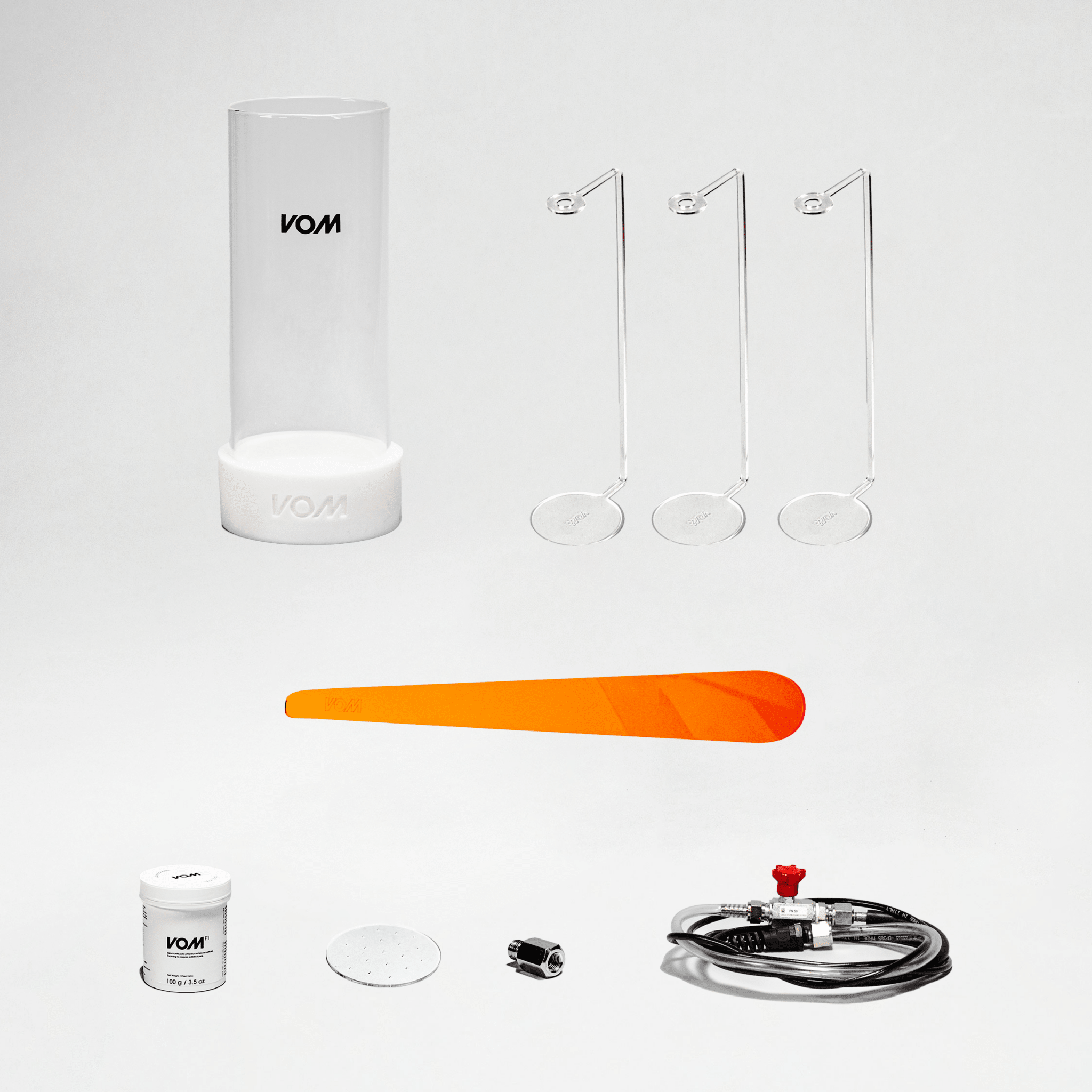 VOM Basic Kit contents laid out — cloud tubes, silicone base and formula bottle